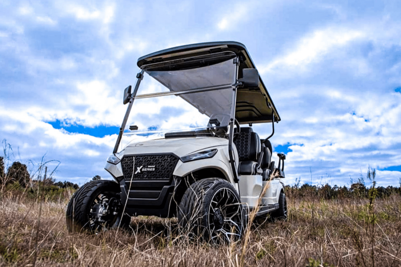 white rent to own golf cart in a field